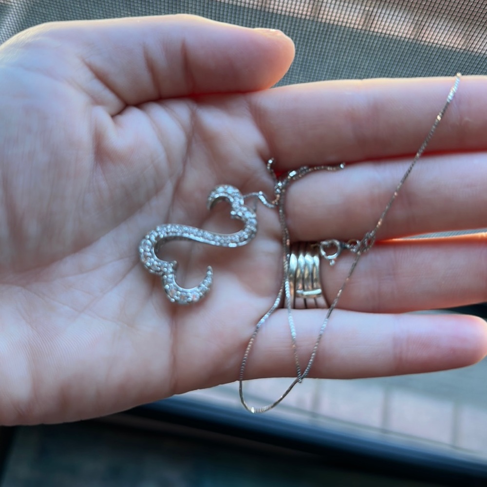 14 carat white gold 1 carat diamond  Jane Seymour open heart necklace, EUC w/ pw